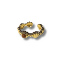 Gold ring with a central brown gemstone on a white background