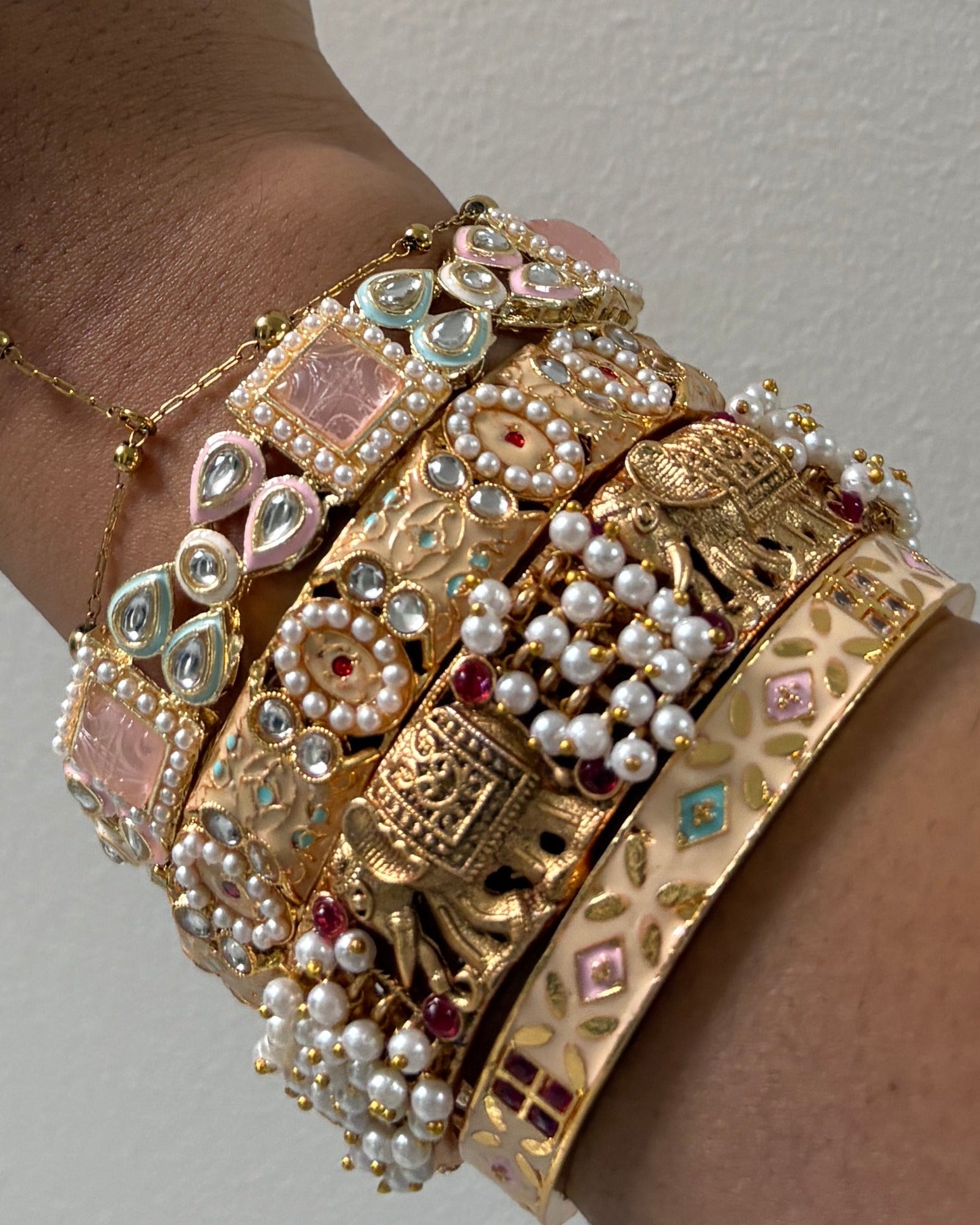 pastel gold bangle stack